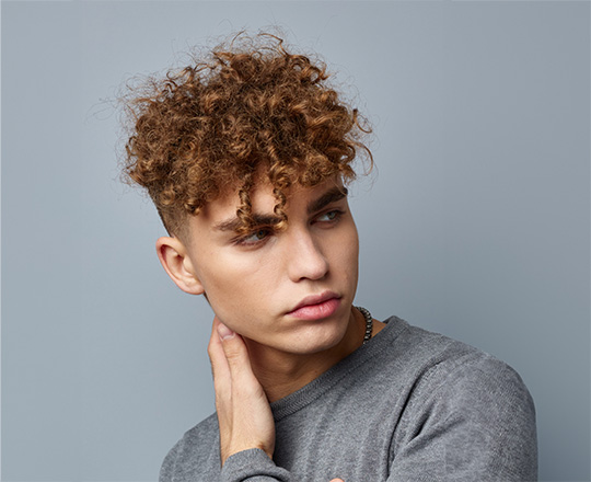men’s curly hair with bangs